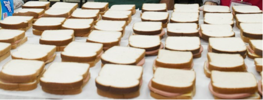 Hundreds of sandwiches are given to the homeless.