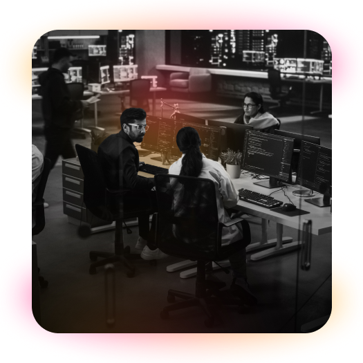 employees talking at their desks