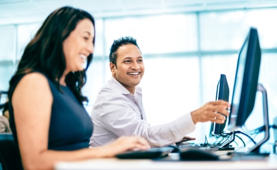 Splunk manager smiling in an office