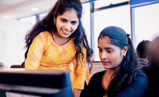 Splunk manager smiling in an office