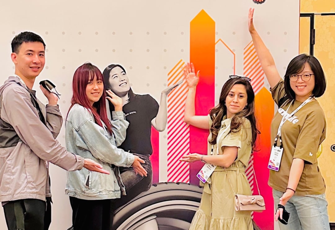 A group of Splunkterns strike a pose in front of a graphic wall in one of our offices.
