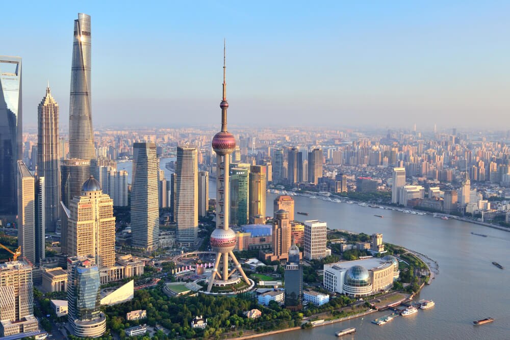  The Oriental Pearl Tower stands on one side of a river in Shanghai, China, set off from other skyscrapers by small parks. Splunk has an office in Shanghai.