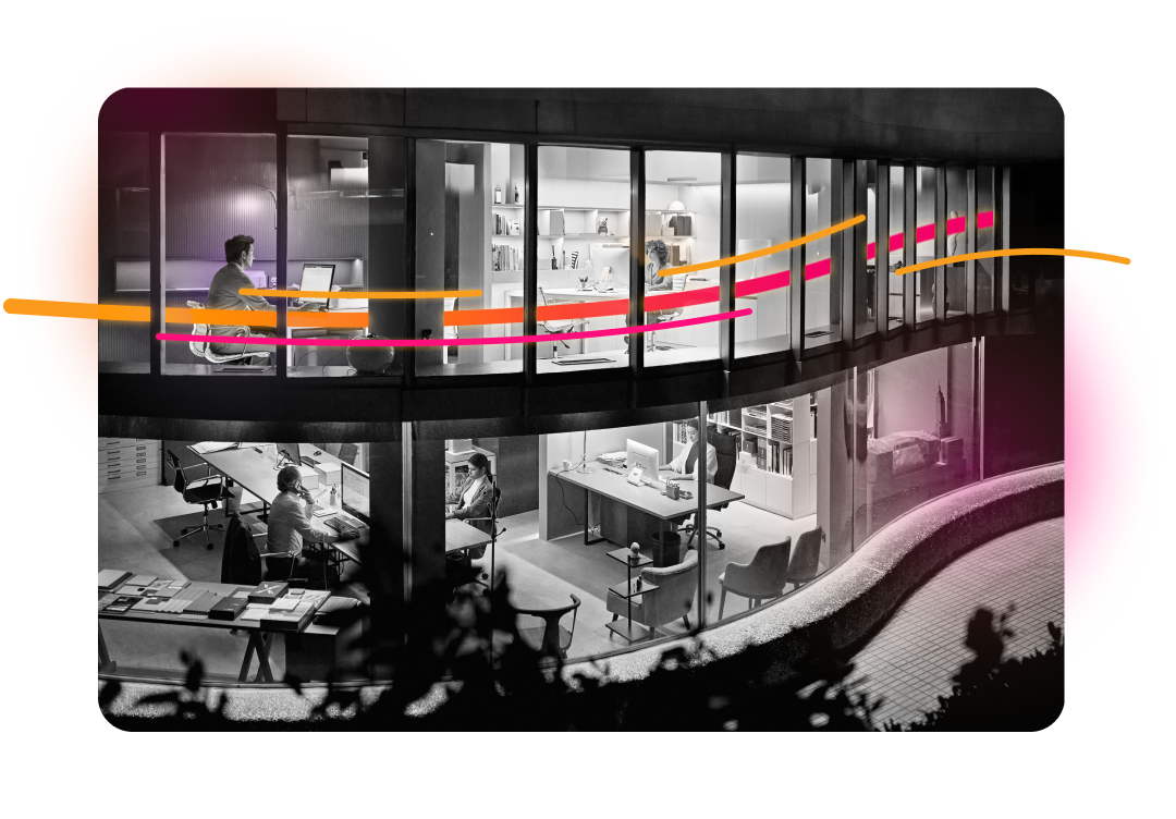 An exterior view of an office building at night, showing multiple people working inside through illuminated windows, with abstract pink and orange lines overlaid on the image.