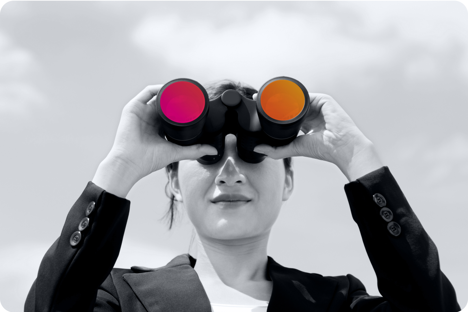 woman looking through binoculars