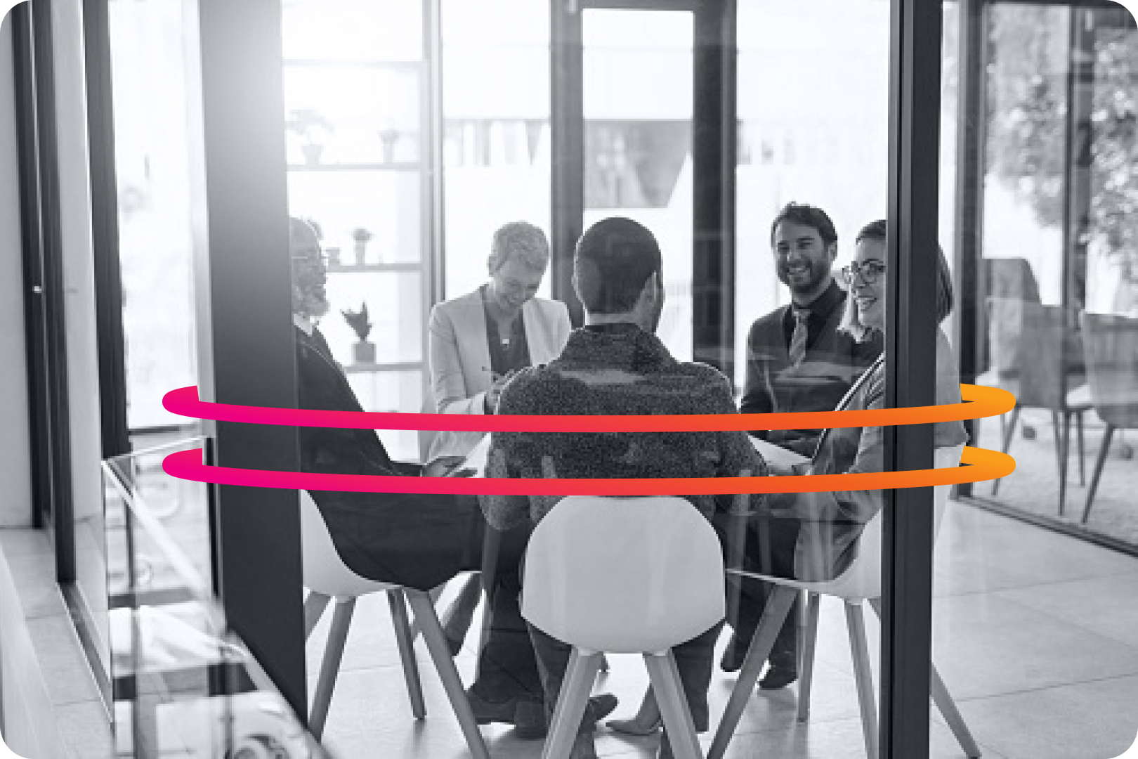 individuals gathered around a meeting table